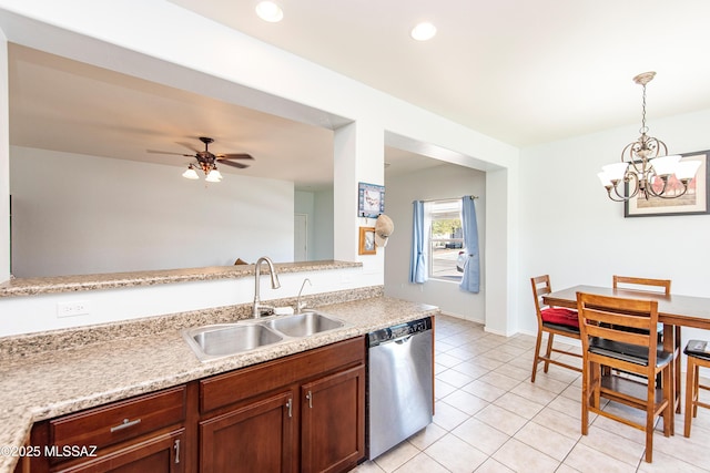 kitchen with sink, light tile patterned floors, ceiling fan, hanging light fixtures, and stainless steel dishwasher