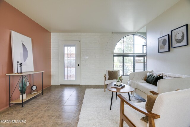 328 S Paseo Pena Unit C, Green Valley, AZ 85614 - tiled living area with brick wall