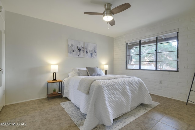 328 S Paseo Pena Unit C, Green Valley, AZ 85614 - bedroom with baseboards, tile patterned flooring, and a ceiling fan
