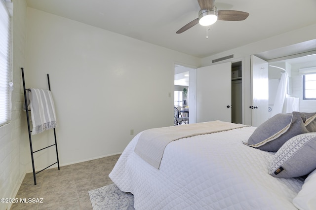 328 S Paseo Pena Unit C, Green Valley, AZ 85614 - bedroom featuring light tile patterned floors, baseboards, ceiling fan, visible vents, and a closet