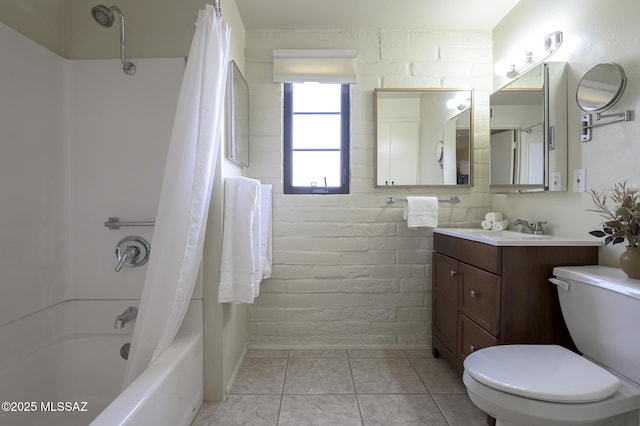 328 S Paseo Pena Unit C, Green Valley, AZ 85614 - bathroom with toilet, tile patterned floors, vanity, shower / tub combo, and brick wall