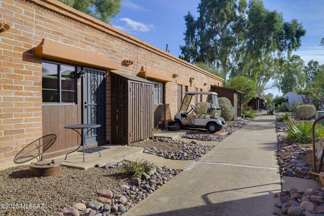 328 S Paseo Pena Unit C, Green Valley, AZ 85614 - exterior space featuring brick siding