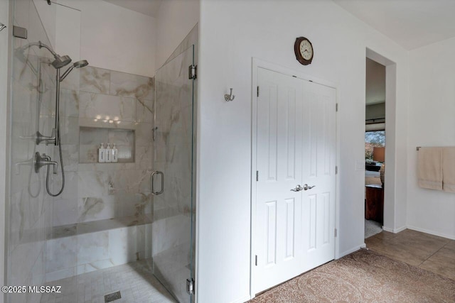bathroom featuring a shower stall