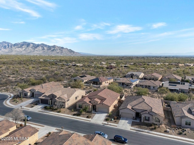 drone / aerial view featuring a mountain view