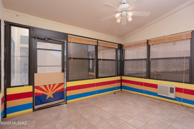 unfurnished room with lofted ceiling and ceiling fan