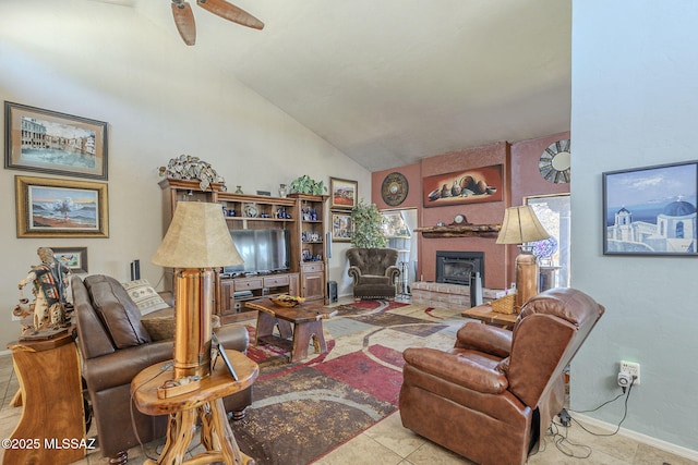 3910 S Via Del Ruisenor, Green Valley, AZ 85622 - living room featuring lofted ceiling, light tile patterned floors, a large fireplace, and ceiling fan
