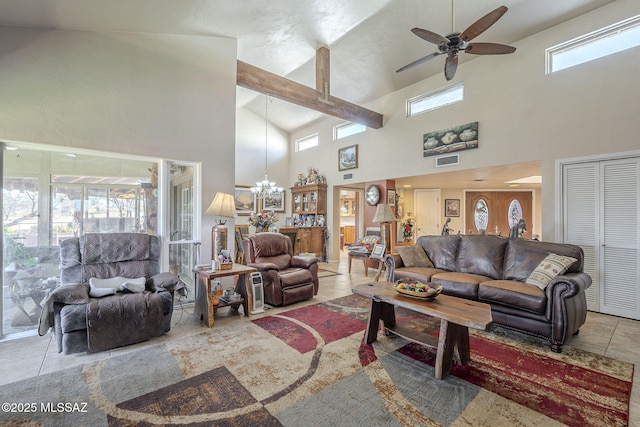 3910 S Via Del Ruisenor, Green Valley, AZ 85622 - living room featuring ceiling fan with notable chandelier and light tile patterned floors