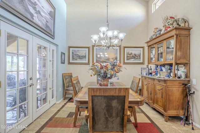3910 S Via Del Ruisenor, Green Valley, AZ 85622 - dining room featuring an inviting chandelier, french doors, and a high ceiling
