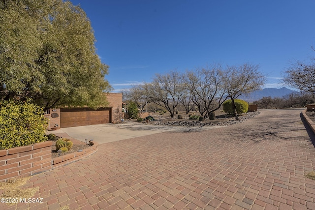 exterior space featuring a mountain view