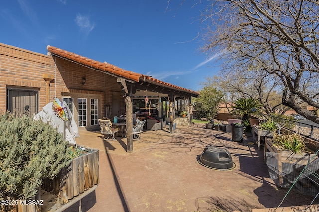 3910 S Via Del Ruisenor, Green Valley, AZ 85622 - view of patio with french doors
