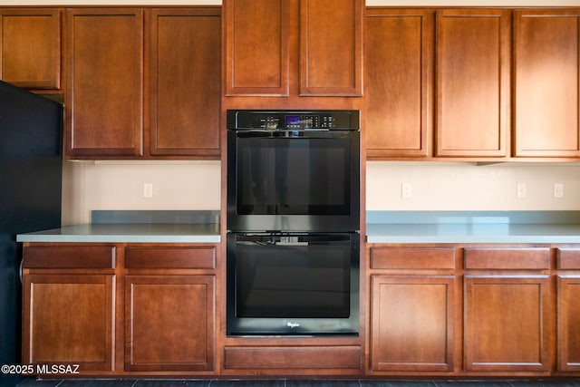 kitchen with black appliances