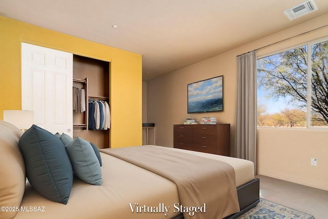 bedroom featuring carpet floors and a closet