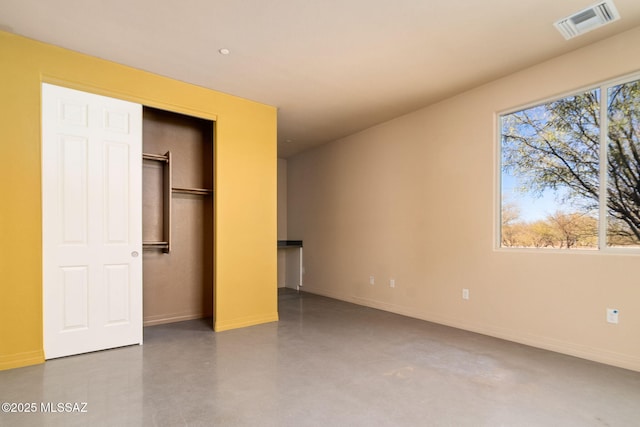 unfurnished bedroom with a closet