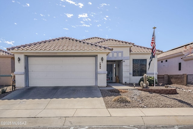 view of front of property with a garage