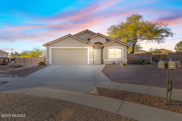 ranch-style home with a garage