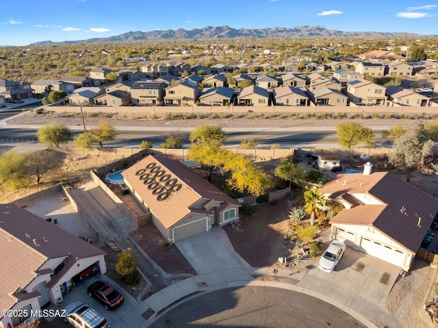 drone / aerial view featuring a mountain view