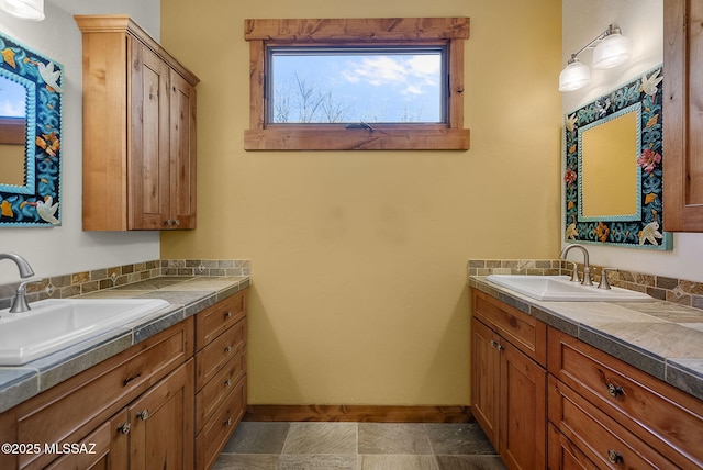 bathroom featuring vanity and a wealth of natural light