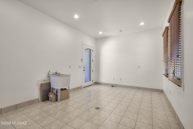 spare room with light tile patterned floors