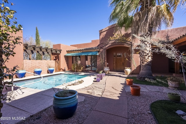 view of pool featuring a patio