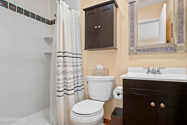 bathroom with vanity, toilet, and walk in shower