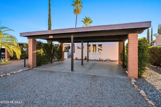 view of car parking featuring a carport