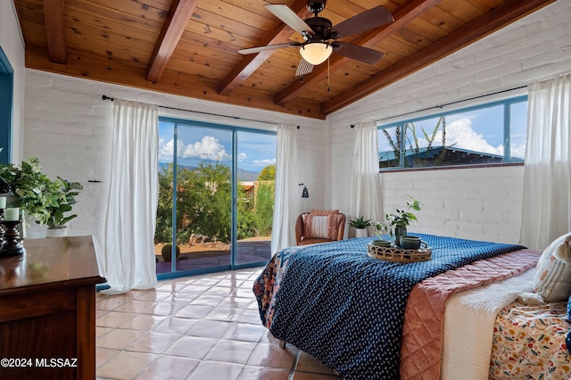 bedroom with wooden ceiling, vaulted ceiling with beams, light tile patterned floors, and access to exterior