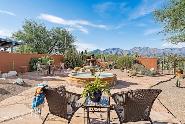 view of patio featuring a mountain view