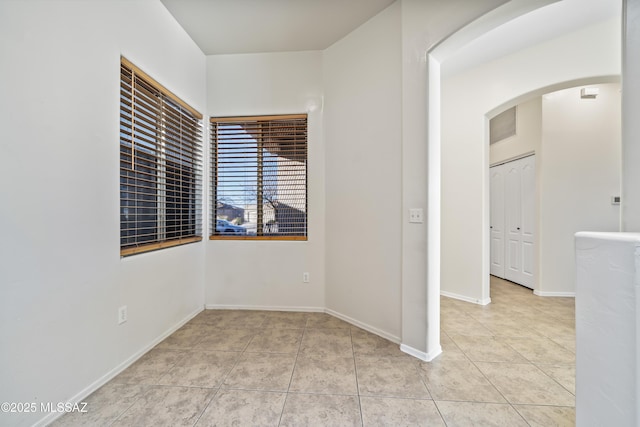 view of tiled spare room