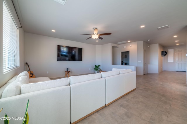 living room featuring ceiling fan