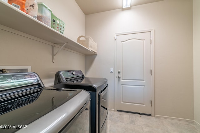 washroom featuring separate washer and dryer