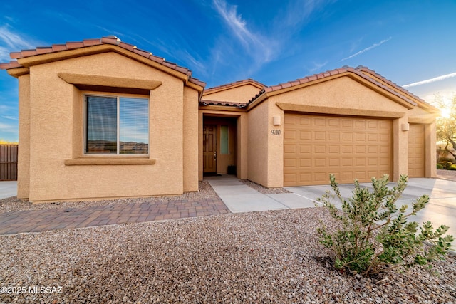 view of front of property featuring a garage