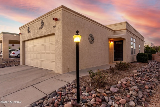 view of front of home with a garage