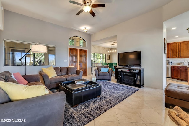 tiled living room featuring ceiling fan