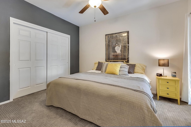 bedroom featuring carpet flooring, ceiling fan, and a closet