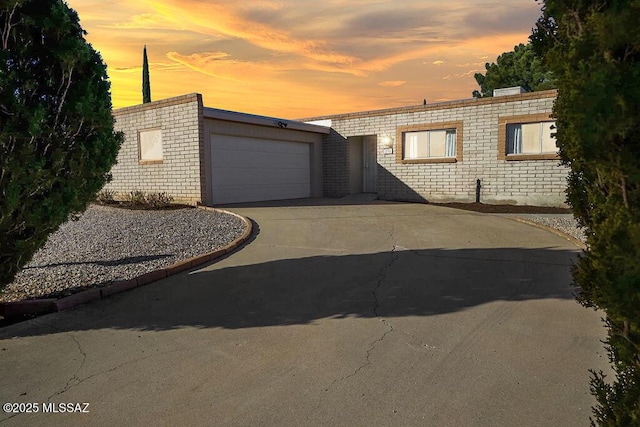 view of front of property with a garage