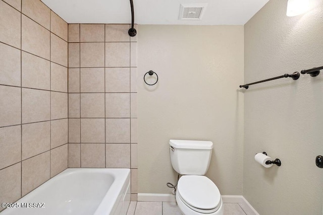 bathroom with tile patterned floors and toilet