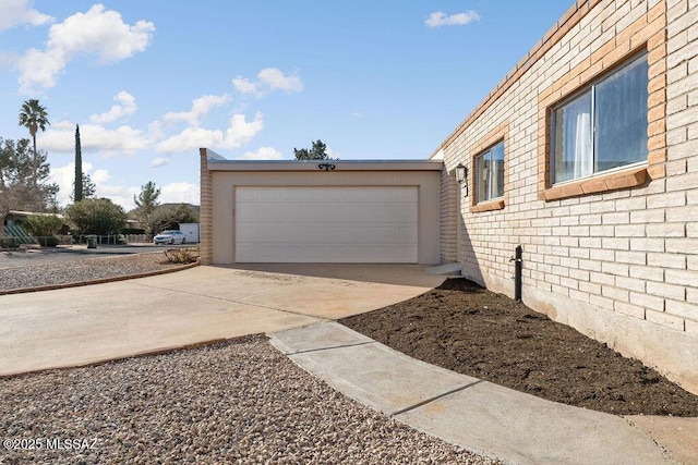 view of side of property featuring a garage