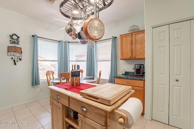 kitchen with light tile patterned floors