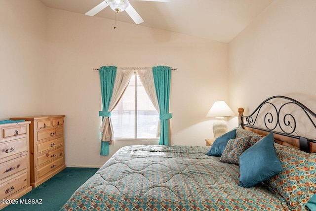 carpeted bedroom featuring vaulted ceiling and ceiling fan