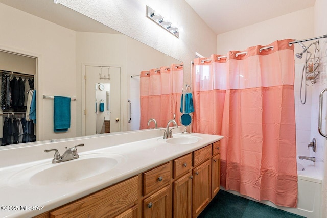 bathroom featuring vanity and shower / bath combination with curtain