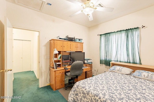 bedroom featuring ceiling fan and carpet