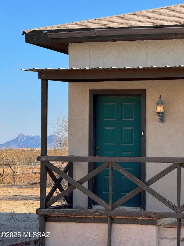 property entrance featuring a mountain view