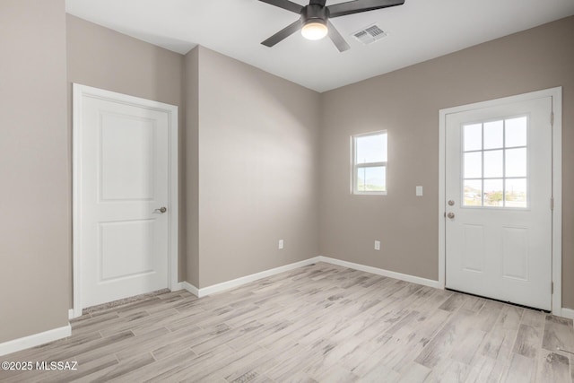 interior space featuring ceiling fan and light wood-type flooring