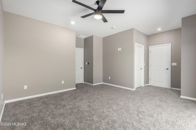 unfurnished bedroom with carpet floors and ceiling fan