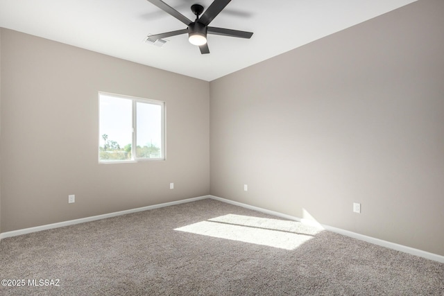 carpeted empty room with ceiling fan