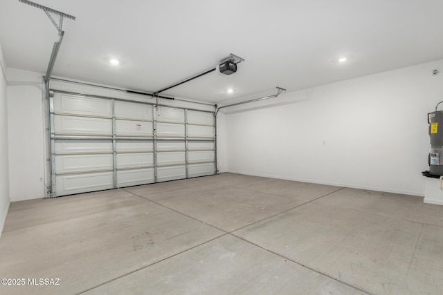 garage with a garage door opener and water heater