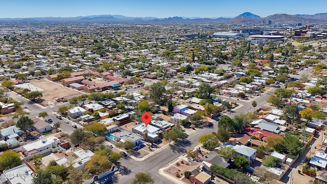 drone / aerial view featuring a mountain view