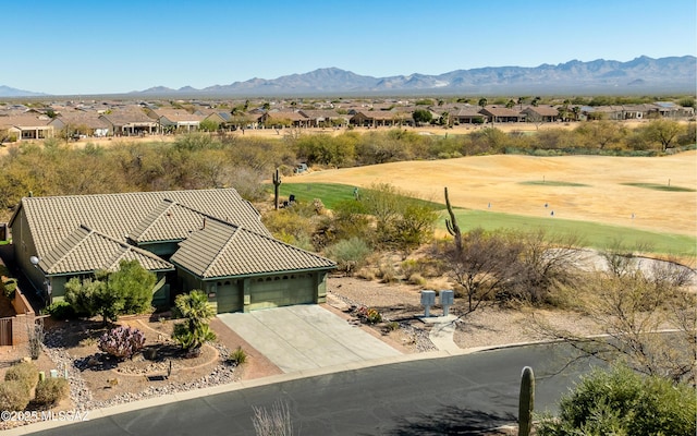 drone / aerial view featuring a mountain view