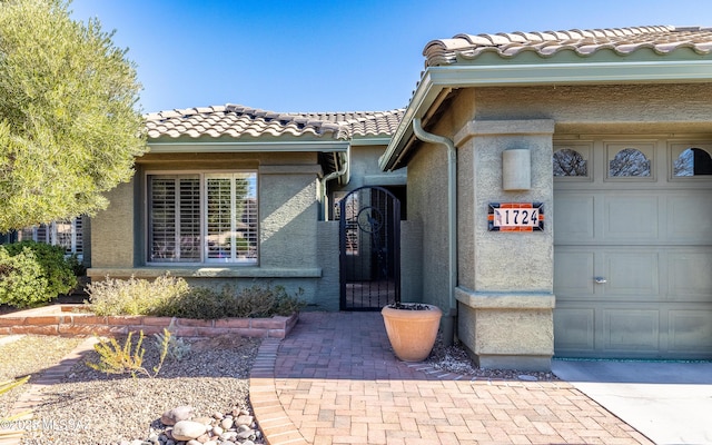 property entrance with a garage