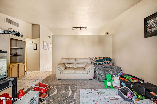 living room with light tile patterned floors